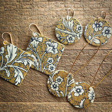 Load image into Gallery viewer, gold with white floral earrings
